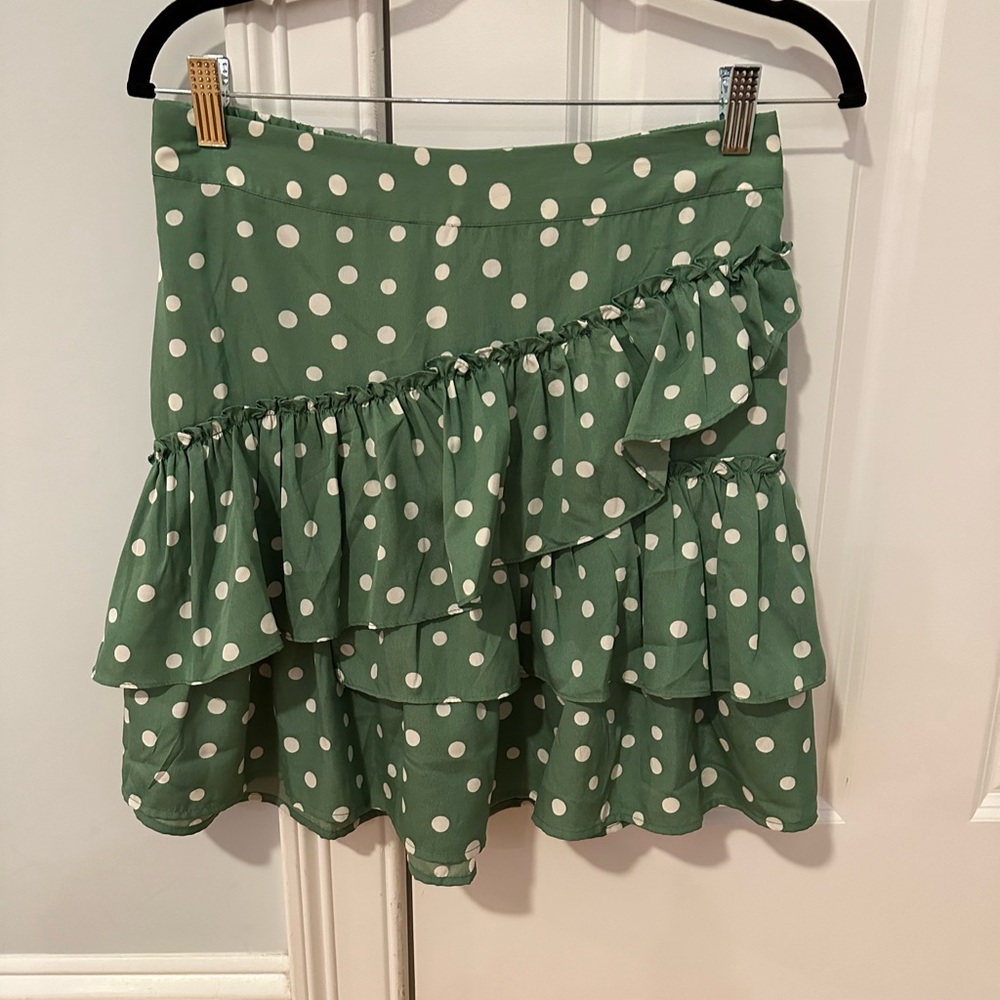 Size small, new with tags green with white polka dots ruffled mini skirt